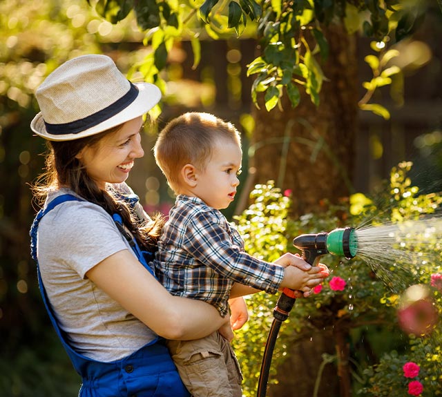 Mother and son gardening in Alabama